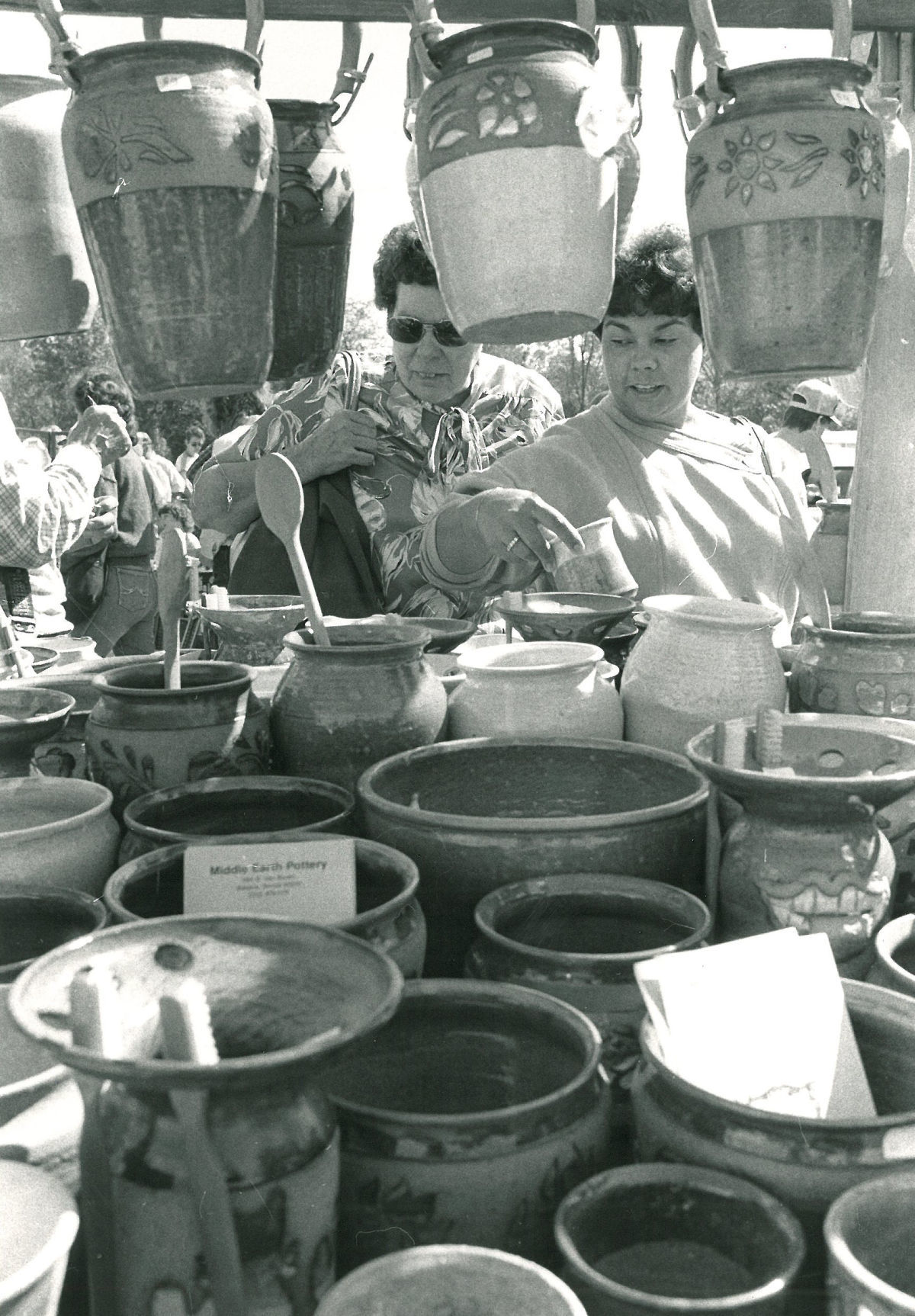 Admiring pottery